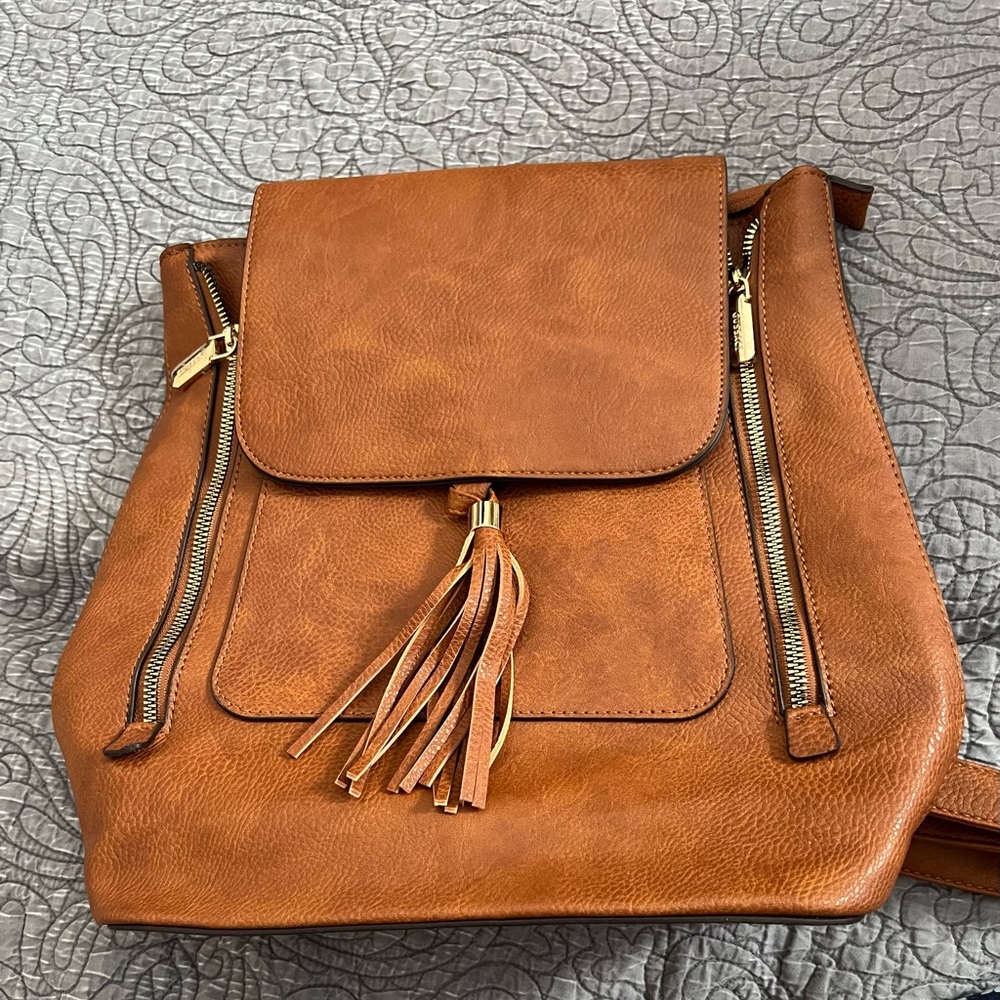 Elegant Tan Leather Backpack with Tassel